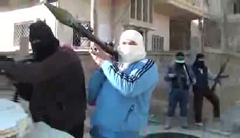 An image grab taken from a video uploaded on YouTube on Sunday shows armed men who are said to be members of the Free Syrian Army.