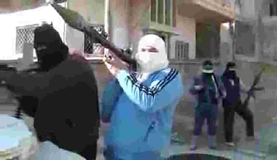 An image grab taken from a video uploaded on YouTube on Sunday shows armed men who are said to be members of the Free Syrian Army.