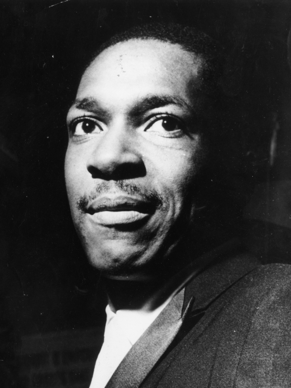 During multiple stints with Miles Davis' groups of the 1950s and early '60s, John Coltrane began to develop his signature sound.