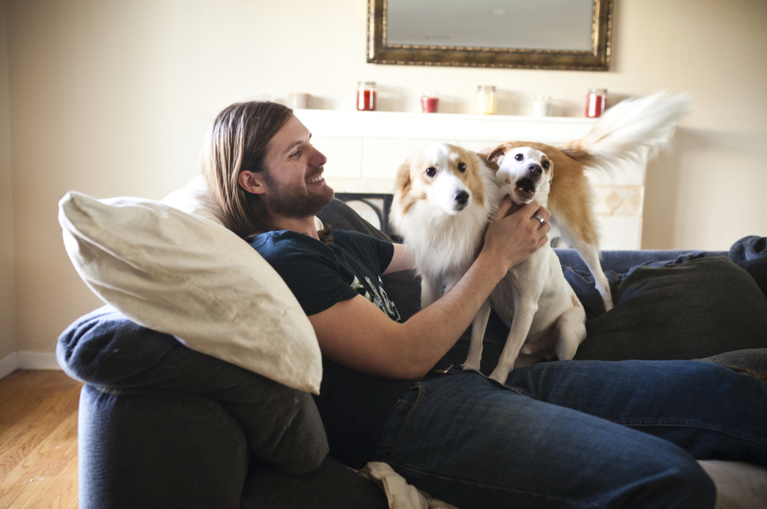 Chris Stephens, 28, who has been battling depression all of his life, plays with his dogs at home in Concord, Calif., on Friday. After a dose of ketamine, Stephens says, "I actually wanted to do things. I wanted to live life."