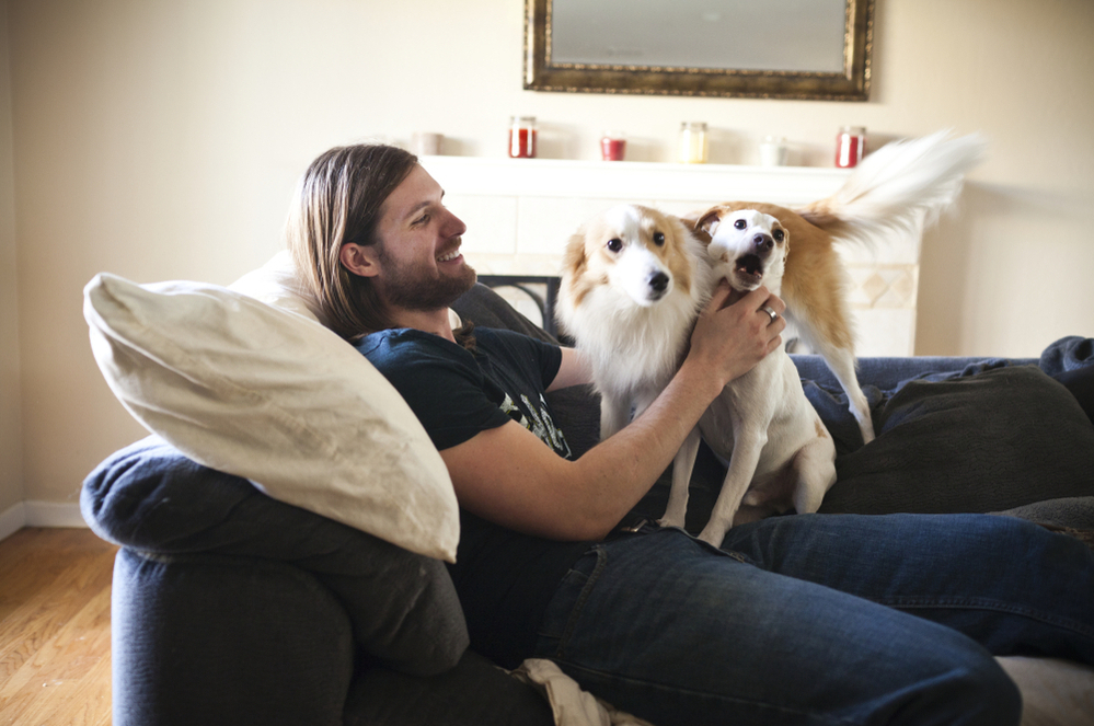 Chris Stephens, 28, who has been battling depression all of his life, plays with his dogs at home in Concord, Calif., on Friday. After a dose of ketamine, Stephens says, "I actually wanted to do things. I wanted to live life."