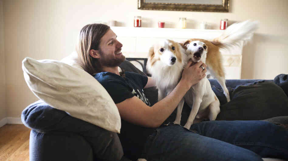 Chris Stephens, 28, who has been battling depression all of his life, plays with his dogs at home in Concord, Calif., on Friday. After a dose of ketamine, Stephens says, "I actually wanted to do things. I wanted to live life."