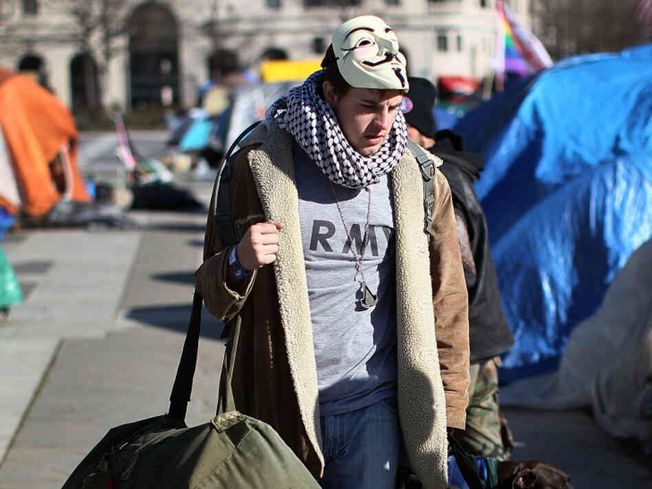 A demonstrator removes his belongings following a deadline to leave the Occupy D.C. encampment at Freedom Plaza on Jan. 30, 2012 in Washington, D.C. The Occupy Wall Street movement has been fighting for months to address the issue of income inequality. A demonstrator removes his belongings following a deadline to leave the Occupy D.C. encampment at Freedom Plaza on Jan. 30, 2012 in Washington, D.C. The Occupy Wall Street movement has been fighting for months to address the issue of income inequality.