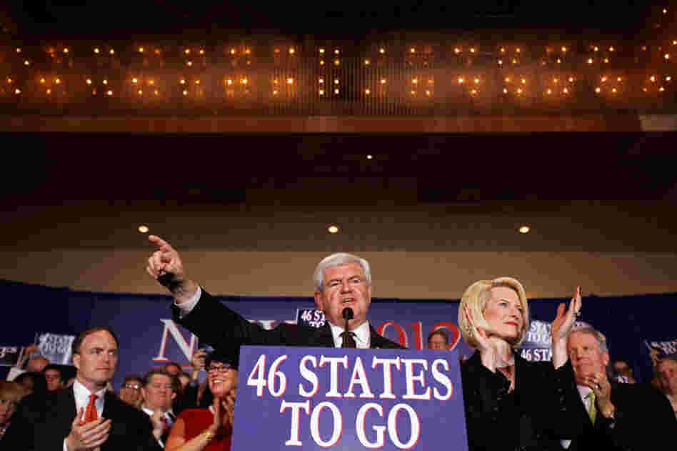 Newt Gingrich addresses his supporters at a primary night rally in Orlando, with his wife, Callista. Gingrich tells supporters: "I pledge to you my life, my fortune and my sacred honor. This is about America." 