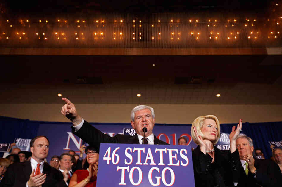 Newt Gingrich addresses his supporters at a primary night rally in Orlando, with his wife, Callista. Gingrich tells supporters: "I pledge to you my life, my fortune and my sacred honor. This is about America." 