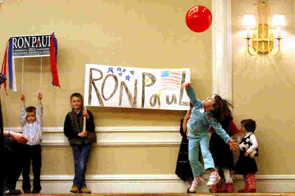 Young Ron Paul supporters wait for Paul to arrive for a town hall meeting in Denver. 