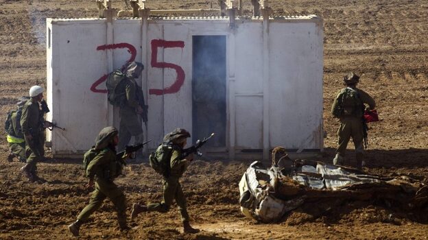 Israeli soldiers take part in an exercise at the Shizafon army base, in the Negev Desert north of the southern city of Eilat, on Tuesday. There are growing signs that Israel may be planning a strike against Iran's nuclear facilities. Israeli soldiers take part in an exercise at the Shizafon army base, in the Negev Desert north of the southern city of Eilat, on Tuesday. There are growing signs that Israel may be planning a strike against Iran's nuclear facilities.