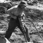 Controlling dust from activities like this was on the minds of those in the Department of Labor in the 1930s, as silicosis, a lung disease, was taking a toll on American workers. Above, a worker jackhammers into rock in Lassen National Forest in California in 1934, preparing to shoot explosives. Controlling dust from activities like this was on the minds of those in the Department of Labor in the 1930s, as silicosis, a lung disease, was taking a toll on American workers. Above, a worker jackhammers into rock in Lassen National Forest in California in 1934, preparing to shoot explosives.