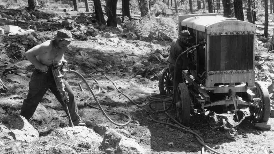 Controlling dust from activities like this was on the minds of those in the Department of Labor in the 1930s, as silicosis, a lung disease, was taking a toll on American workers. Above, a worker jackhammers into rock in Lassen National Forest in California in 1934, preparing to shoot explosives. Controlling dust from activities like this was on the minds of those in the Department of Labor in the 1930s, as silicosis, a lung disease, was taking a toll on American workers. Above, a worker jackhammers into rock in Lassen National Forest in California in 1934, preparing to shoot explosives.