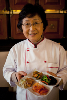 Yesoon Lee makes jook and chicken soup for her children when they're ill. Yesoon Lee makes jook and chicken soup for her children when they're ill.