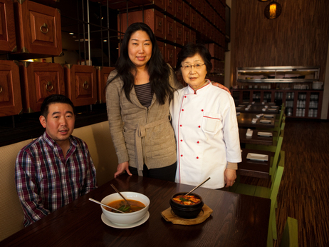 Danny Lee, Jean Lee and their mother, Yesoon Lee, cook home-style Korean soups at their Mandu restaurants in Washington, D.C. Danny Lee, Jean Lee and their mother, Yesoon Lee, cook home-style Korean soups at their Mandu restaurants in Washington, D.C.