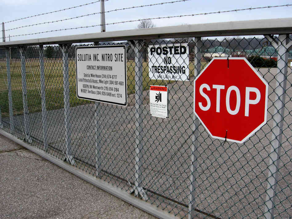 A gate into the former Monsanto chemical plant near Nitro, W.Va. A class-action lawsuit filed against Monsanto (and subsequent company Solutia) claims the company improperly polluted the town with dioxin.