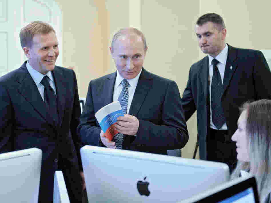 With the Russian presidential election set for next month, the heavily favored candidate, Prime Minister Vladimir Putin, visited the election center last week as it prepared for the polls. 