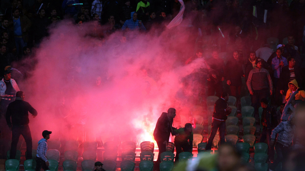 Flares were thrown in the stadium during clashes that erupted after a football match between Egypt's Al-Ahly and Al-Masry teams in Port Said.