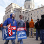 Union members protesting the right-to-work legislation wait to enter the Statehouse in Indianapolis on Wednesday. Union members protesting the right-to-work legislation wait to enter the Statehouse in Indianapolis on Wednesday.