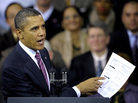 President Obama holds a proposed mortgage application in Falls Church, Va., Wednesday, Feb. 1, 2012. President Obama holds a proposed mortgage application in Falls Church, Va., Wednesday, Feb. 1, 2012.