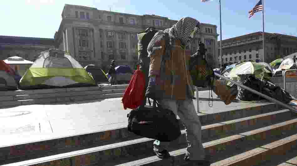 A protester at the Occupy D.C. encampment in Freedom Plaza packed up his belongings Monday ahead of a National Park Service deadline to clear out. A protester at the Occupy D.C. encampment in Freedom Plaza packed up his belongings Monday ahead of a National Park Service deadline to clear out.