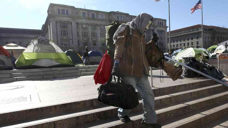 A protester at the Occupy D.C. encampment in Freedom Plaza packed up his belongings Monday ahead of a National Park Service deadline to clear out. A protester at the Occupy D.C. encampment in Freedom Plaza packed up his belongings Monday ahead of a National Park Service deadline to clear out.