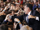Former Massachusetts Gov. Mitt Romney celebrates his Florida primary election win at the Tampa Convention Center on Tuesday. Former Massachusetts Gov. Mitt Romney celebrates his Florida primary election win at the Tampa Convention Center on Tuesday.