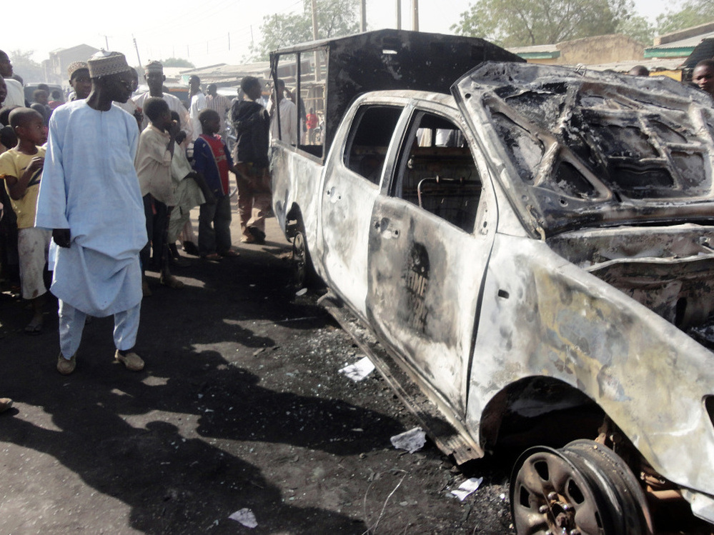 A resident inspects a police van outside Sheka police station in the northern Nigerian city of Kano last month. Members of the Boko Haram Islamist group attacked the station the previous night. The group recently released a video calling for jihadis to focus on the United States.