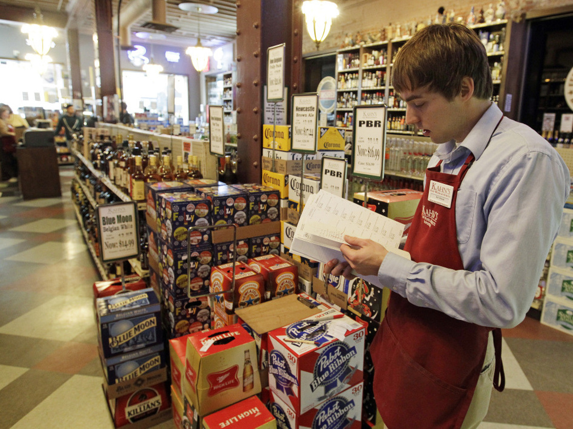 Indiana laws bar all carryout alcohol sales on Sundays, leaving Super Bowl revelers in the lurch in their quest for any 11th-hour 12-pack the day of the big game. At Kahn's Fine Wines and Spirits in Indianapolis  earlier this week, Bill Cheek was putting labels on cases of beer.