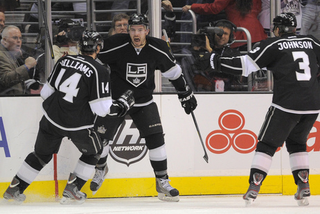 Los Angeles Kings defenseman Drew Doughty, center, celebrates with right wing Justin Williams, left, and defenseman Jack Johnson after scoring the game-winning goal during the third period of their NHL hockey game against the Columbus Blue Jackets on Wednesday. Los Angeles Kings defenseman Drew Doughty, center, celebrates with right wing Justin Williams, left, and defenseman Jack Johnson after scoring the game-winning goal during the third period of their NHL hockey game against the Columbus Blue Jackets on Wednesday.