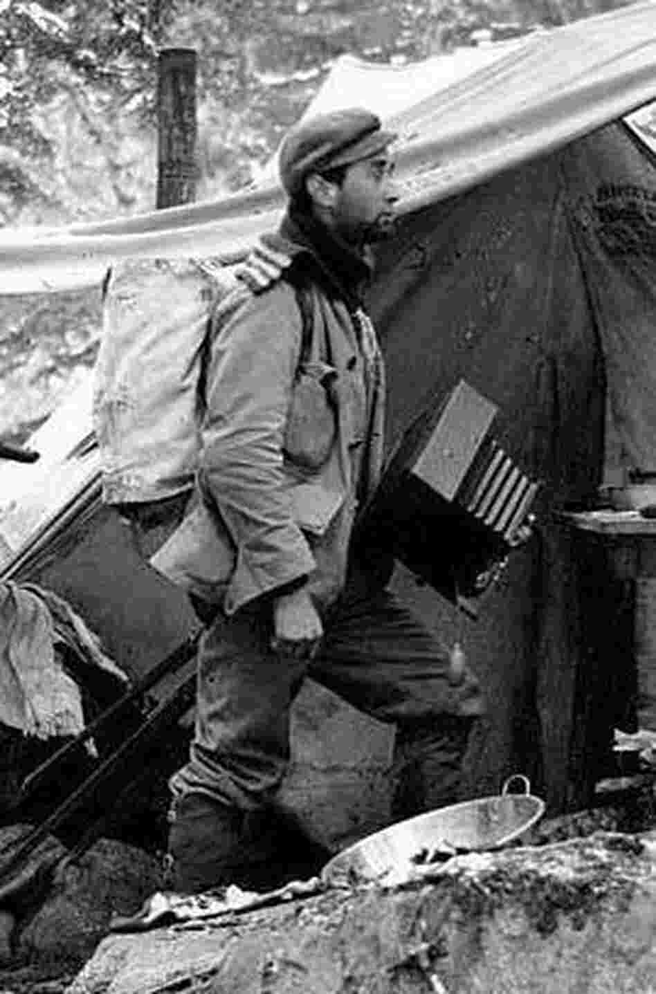 Asahel Curtis and his camera at a roadhouse, on the White Pass or Skagway Trail, circa 1887 Asahel Curtis and his camera at a roadhouse, on the White Pass or Skagway Trail, circa 1887