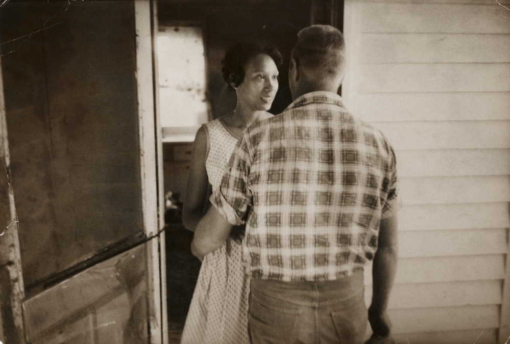 Mildred Loving greets her husband, Richard, on their front porch, 1965.
