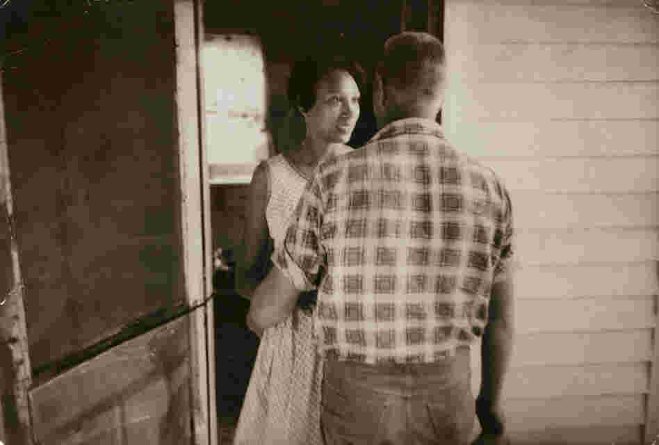 Mildred Loving greets her husband, Richard, on their front porch, 1965.