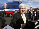 Newt Gingrich greets supporters during a campaign appearance at a restaurant in Reno, Nev., on Wednesday. He said Thursday he will challenge Florida's winner-take-all scheme for awarding delegates. Newt Gingrich greets supporters during a campaign appearance at a restaurant in Reno, Nev., on Wednesday. He said Thursday he will challenge Florida's winner-take-all scheme for awarding delegates.