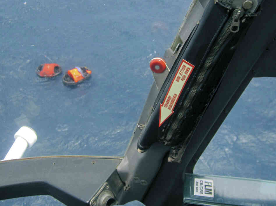 Two life rafts from the MV Rabaul Queen, seen from a helicopter, float in the open waters off Papua New Guinea's east coast, earlier today (Feb. 2, 2012).