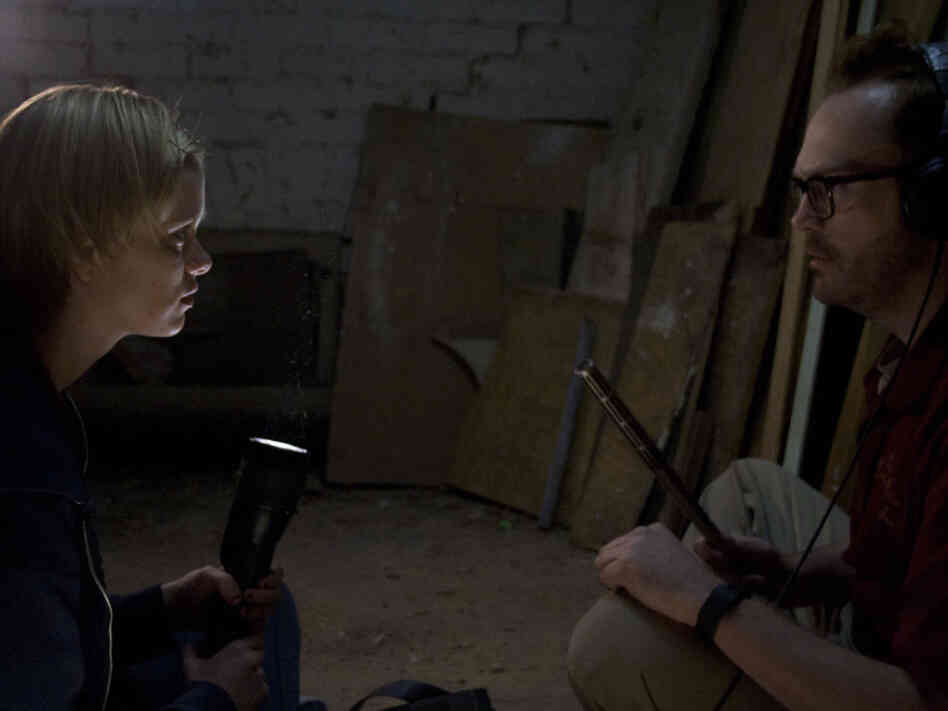 Low-wage desk-clerks Claire and Luke (Pat Healy) break up the monotony by hunting for the ghost of a woman rumored to have died in the hotel. Low-wage desk-clerks Claire and Luke (Pat Healy) break up the monotony by hunting for the ghost of a woman rumored to have died in the hotel.