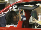 A Chrysler auto worker at the Belvidere, Ill. plant, Thursday, Feb. 2, 2012, where a third shift will be added. A Chrysler auto worker at the Belvidere, Ill. plant, Thursday, Feb. 2, 2012, where a third shift will be added.