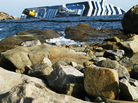The Costa Concordia cruise ship remains half-submerged three weeks after it crashed. It continues to be a source of anger for local residents. The Costa Concordia cruise ship remains half-submerged three weeks after it crashed. It continues to be a source of anger for local residents.