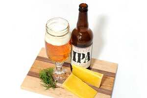 Farmhouse Cheddar and IPA: "I like IPAs with farmhouse cheddar. They're both kind of sharp and fruity; they both have kind of explosively big flavors. I think those work nicely together," Oliver says. If you have trouble finding a true "farmhouse" cheddar, a clothbound, aged cheddar should fill in nicely.