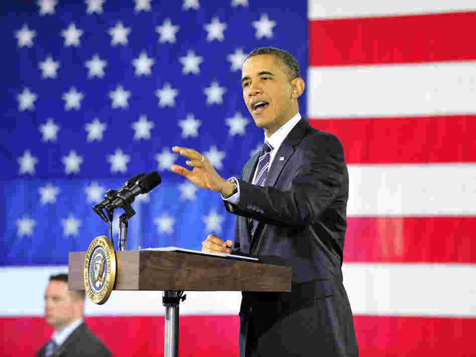 President Obama speaks about the economy Friday in Arlington, Va. Obama says he wants to "send a clear message to Congress: Do not slow down the recovery that we're on."