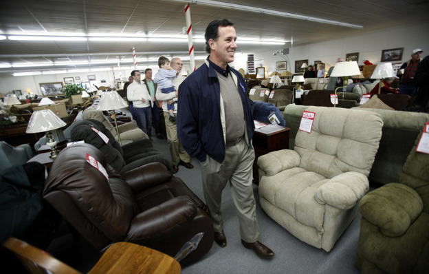 Republican presidential candidate Rick Santorum walks among recliners during a campaign stop at a furniture store in Iowa in December. Recliner sales have been rising fast leading up to the Super Bowl. Republican presidential candidate Rick Santorum walks among recliners during a campaign stop at a furniture store in Iowa in December. Recliner sales have been rising fast leading up to the Super Bowl.