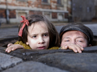 Sewage worker Leopold Socha (Robert Wieckiewicz, right) and Krystyna Chiger (Milla Bankowicz) peek from their underground hideaway in Nazi-occupied Lvov, Poland. Sewage worker Leopold Socha (Robert Wieckiewicz, right) and Krystyna Chiger (Milla Bankowicz) peek from their underground hideaway in Nazi-occupied Lvov, Poland.