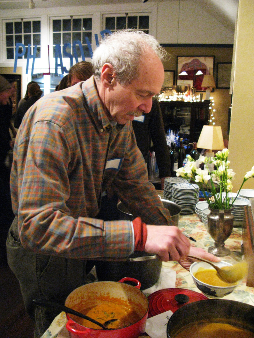 Jon Landau serves others at PhilaSoup, a soup group based in Philadelphia. 