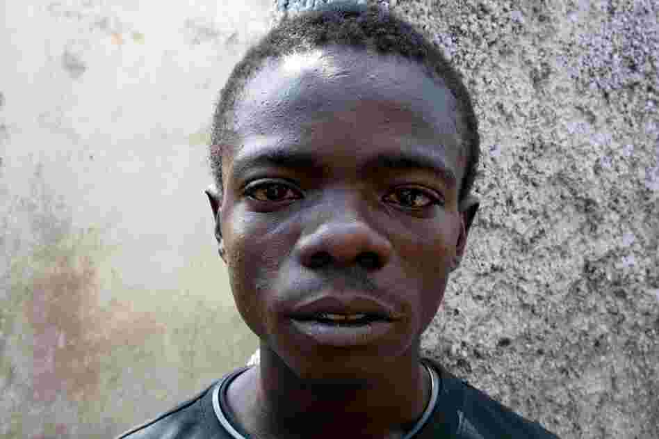 Edison Charles, 19, contracted cholera early in 2011 and spent six days in a clinic. He says the disease is all over the Port-au-Prince slum of Cite Soleil: "The cholera is like death; it's going from door to door." 