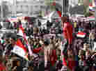 Egyptians continue demonstrating in Cairo's Tahrir Square on Jan. 26, 2012. Tens of thousands of Egyptian people gathered Monday to celebrate the anniversary of the start of the uprising that ended President Hosni Mubarak's rule. Egyptians continue demonstrating in Cairo's Tahrir Square on Jan. 26, 2012. Tens of thousands of Egyptian people gathered Monday to celebrate the anniversary of the start of the uprising that ended President Hosni Mubarak's rule.