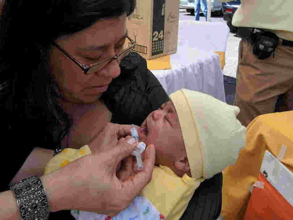 A baby is inoculated against rotavirus in Honduras in early 2009. 