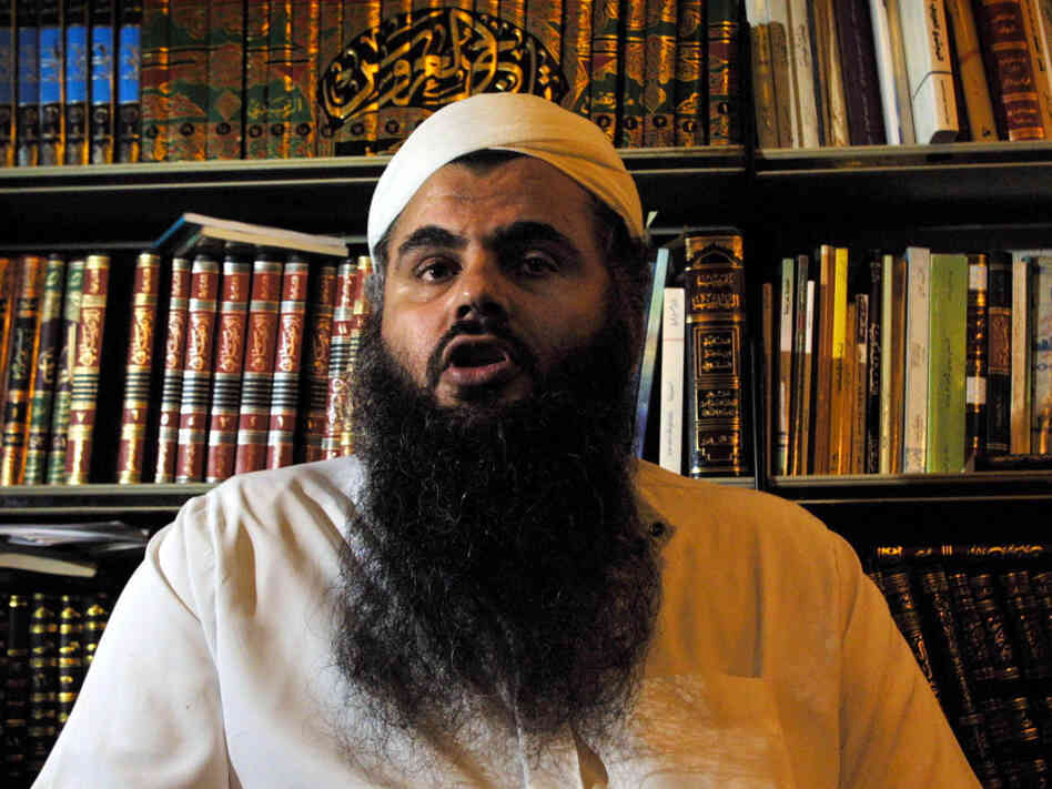 Omar Othman, better known as Abu Qatada, is seen at his North London home in October 2001. A British court ruled Monday that he should be released on bail. Although he was never charged with a crime, British officials say he's a "dangerous" supporter of radical Islam.