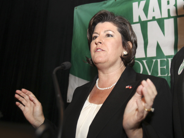 Georgia gubernatorial candidate Karen Handel talks with supporters at an election-night party in Atlanta in August. Handel, who lost a runoff for the GOP nomination, then became a top official at Susan G. Komen for the Cure.
