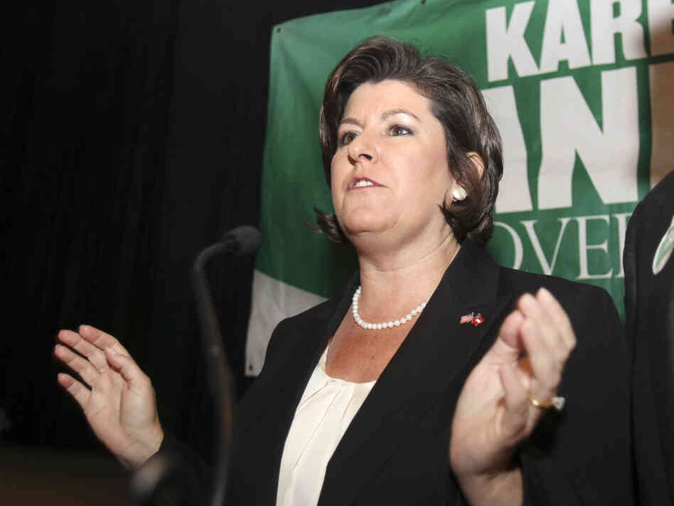 Georgia gubernatorial candidate Karen Handel talks with supporters at an election-night party in Atlanta in August. Handel, who lost a runoff for the GOP nomination, then became a top official at Susan G. Komen for the Cure.