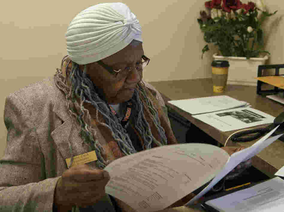 Ella Washington, 83, works as a receptionist three days a week at Holly Hall Apartments, a housing complex for disabled and elderly people in Silver Spring, Md.