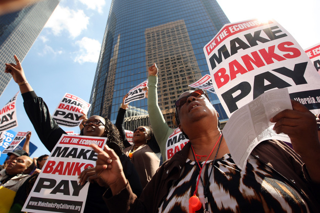 Anti-Wall Street demonstrators march on banks in Los Angeles in October.