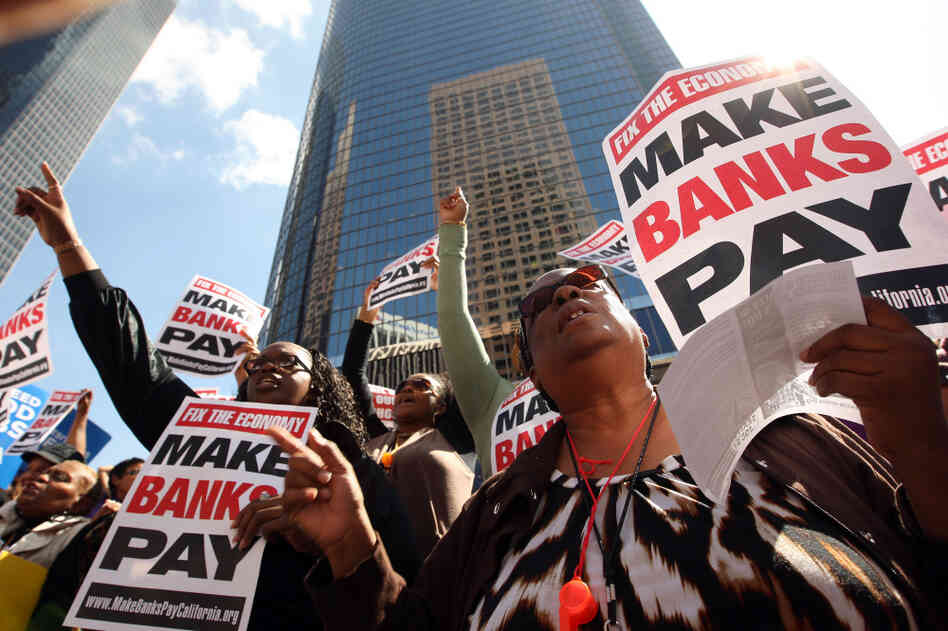 Anti-Wall Street demonstrators march on banks in Los Angeles in October.