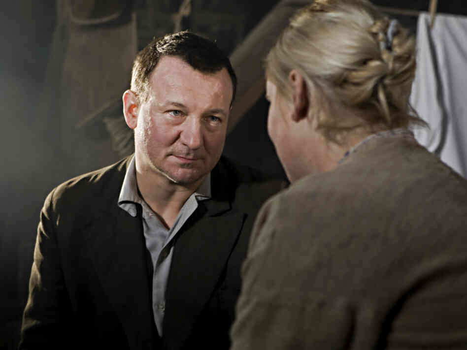 Leopold and his wife, Wanda (Kinga Preis), risk their security to shelter the Jews in their city — but profit, along with principle, is among their motivations. Leopold and his wife, Wanda (Kinga Preis), risk their security to shelter the Jews in their city — but profit, along with principle, is among their motivations.