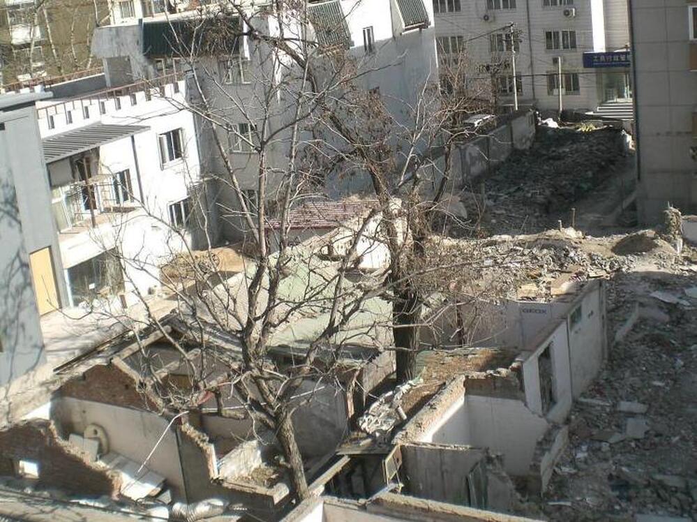 Liang Sicheng, known as the father of modern Chinese architecture, lobbied Mao Zedong to preserve ancient buildings in Beijing. Despite efforts to have his former courtyard home in Beijing preserved as a cultural relic, it was recently demolished.